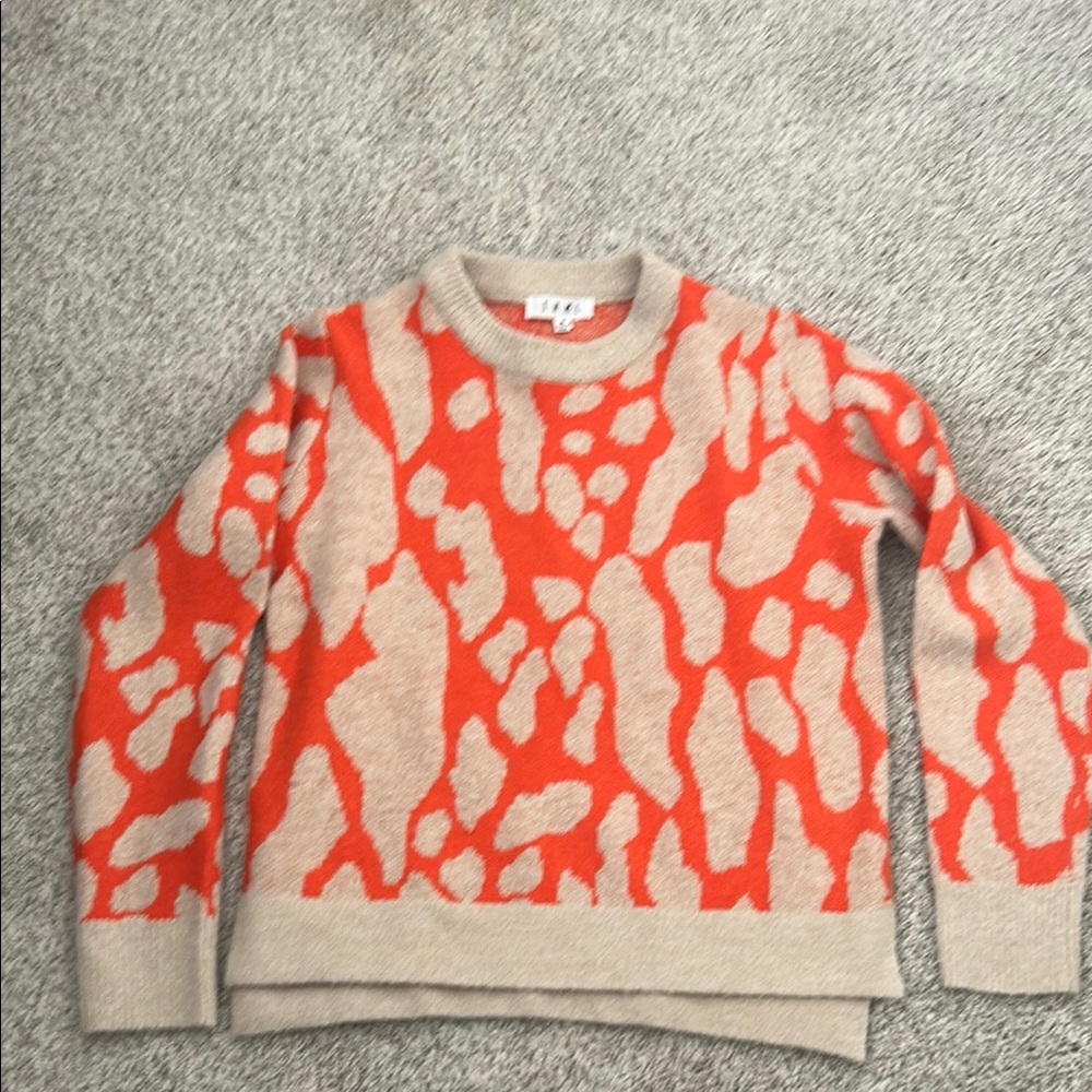 Nwot THML Sweater Sz M

Orange and cream patterned sweater. Super soft and cozy.
